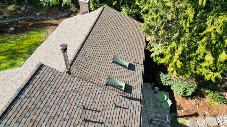 Close up view of Skylights on Composite Asphalt Shingles Roof in Covington, Washington