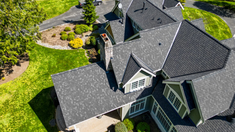 Close up View of back of Home with Composite Asphalt Shingle Roof in Issaquah, Washington