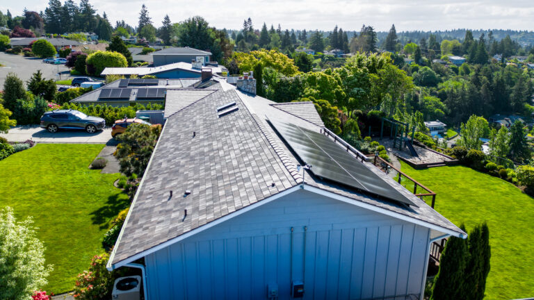 Side View of Home with Synthetic Shake Roof in Three Tree Point, Washington