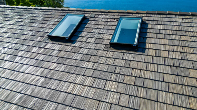 Very Close View of Home with Synthetic Shake Roof in Three Tree Point, Washington