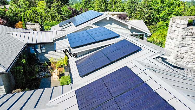 Closeup view from the top of the roof of the Beautiful Nu-Ray Metal Roof with solar panels in Clyde Hill, Washington.