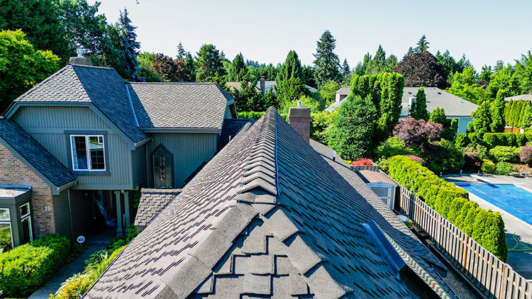 Close up view of ridge line of the Cedar Conversion to Asphalt Shingle Roof in Bellevue, Washington