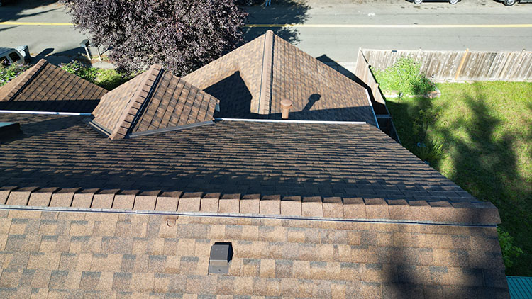 Closeup view of the ridge line and roof valleys of the Composite Asphalt Shingle Roof in Kent, Washington